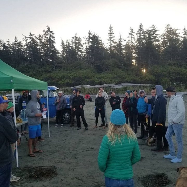 a group of people standing in front of a crowd
