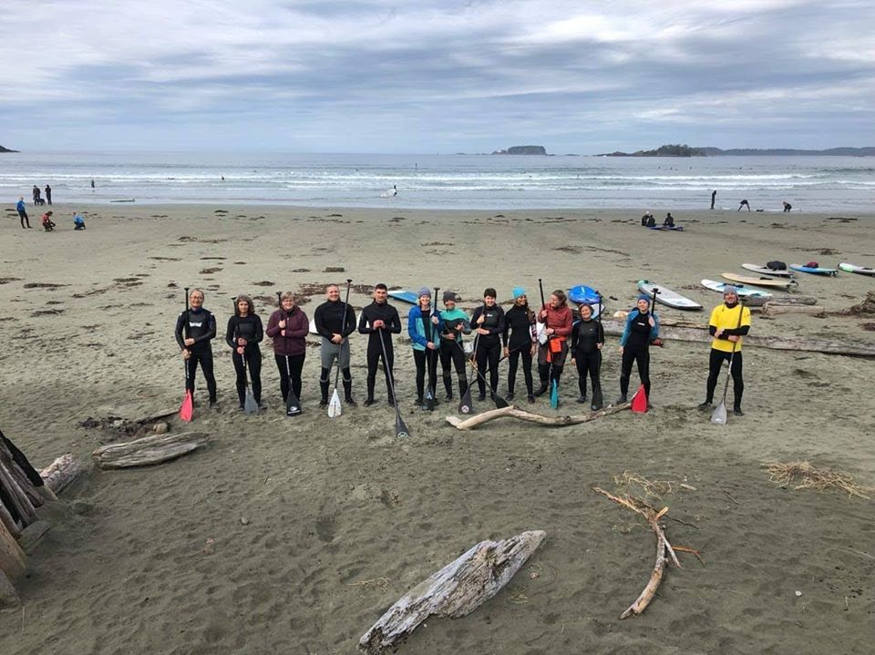 a group of people on a beach