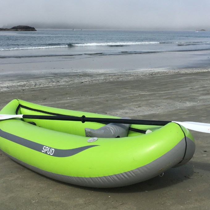 a boat sitting on top of a beach