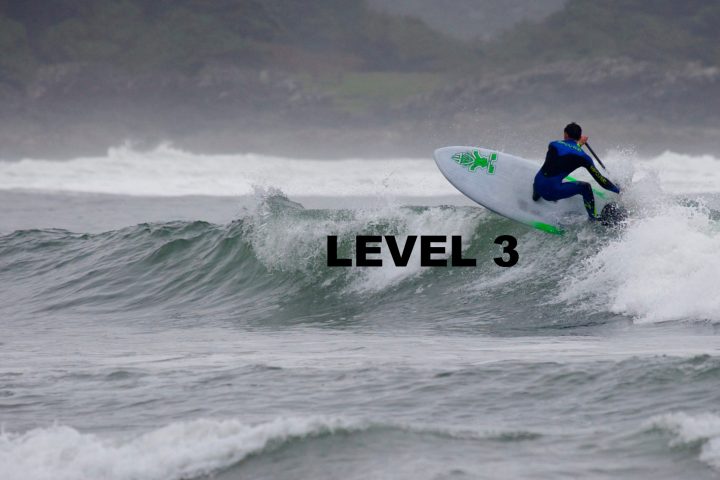 a man riding a wave on a surf board on a body of water