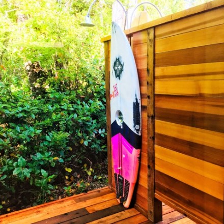 a bench in front of a mirror posing for the camera