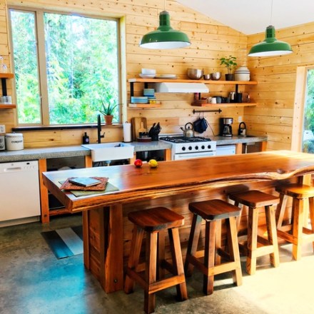 a dining room table in front of a wooden floor