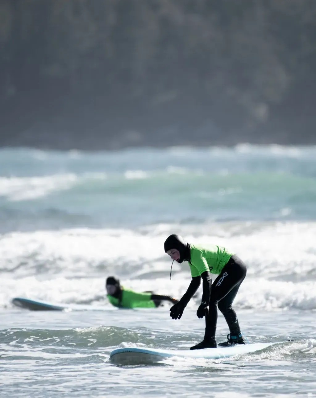 a person riding a wave on a surfboard in the ocean