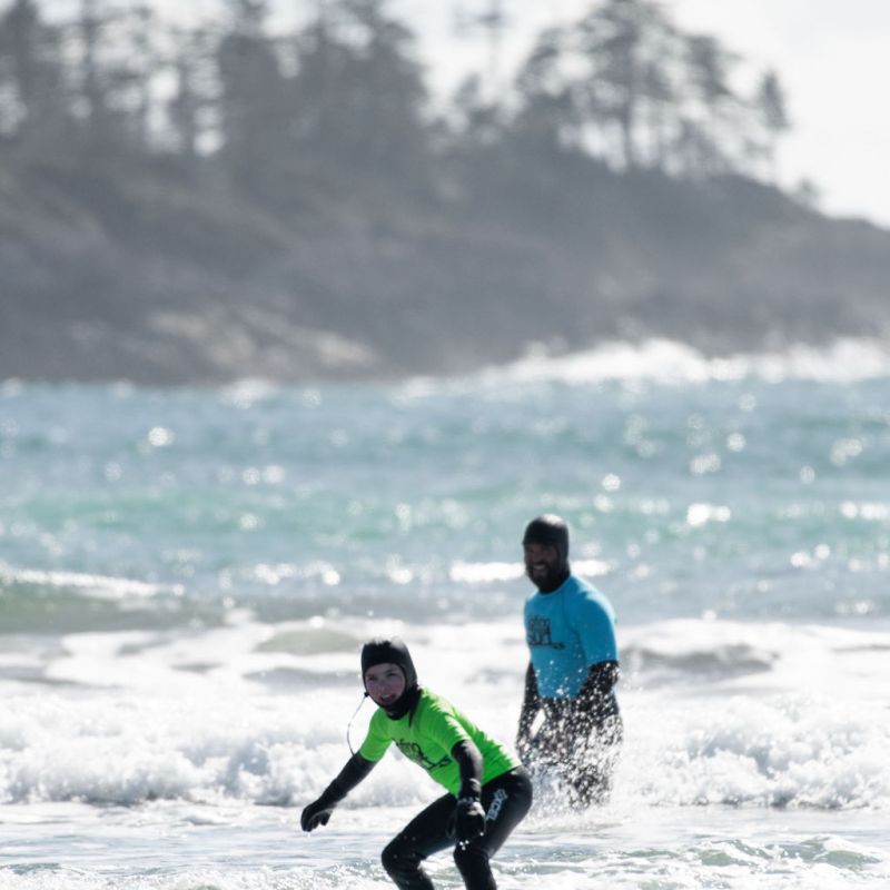 a person riding a wave on a surfboard in the ocean